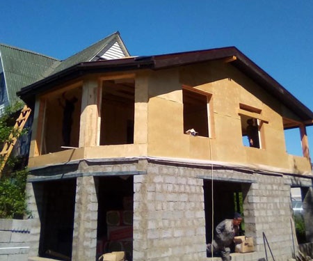 строительство комбинированного дома камень